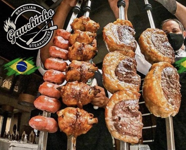 All-You-Can-Eat Brazilian Steakhouse Rodizio for 2 with a Bottle of Wine; Sunday-Thursday - Gauchinho Brazilian Steakhouse Greenville