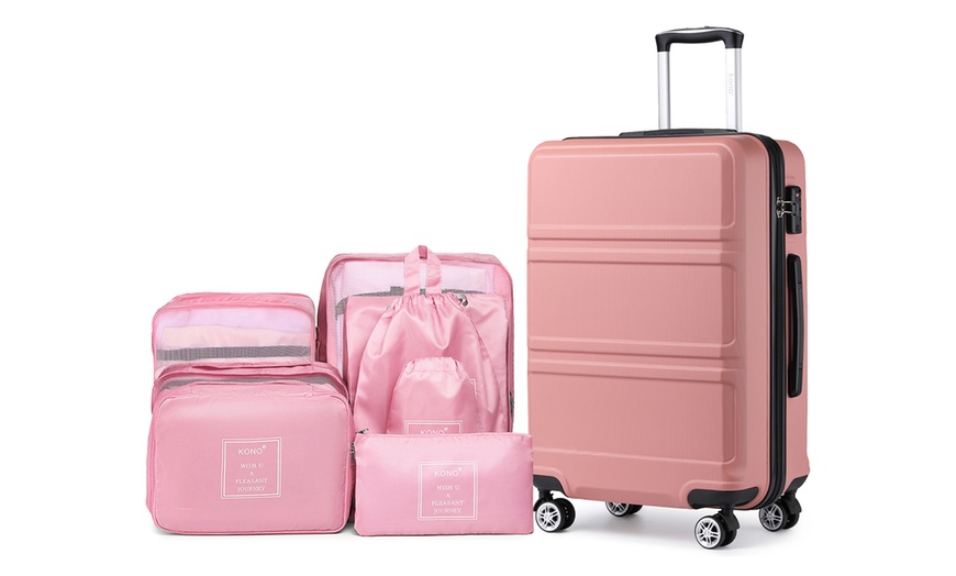 Image 5: 1 of 3 roze harde koffers