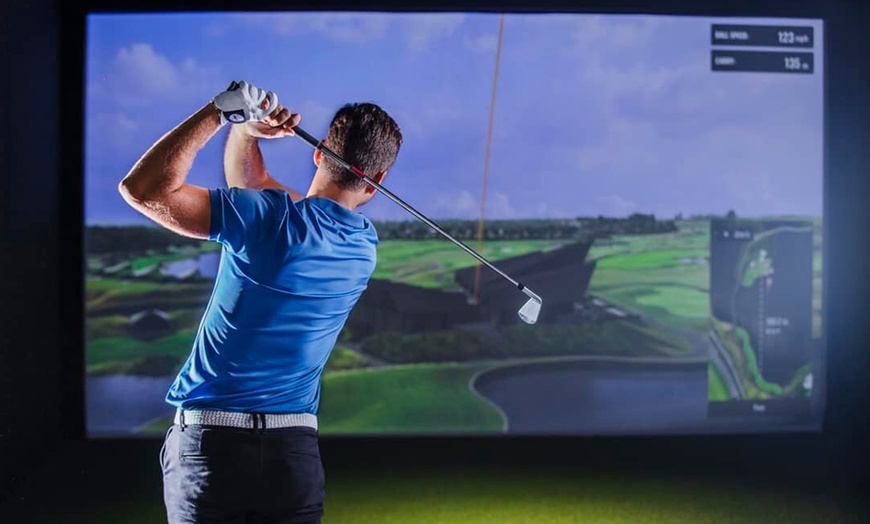 Image 3: Experience Up to 4 Hours of Indoor Golf Fun with Bay Rental 