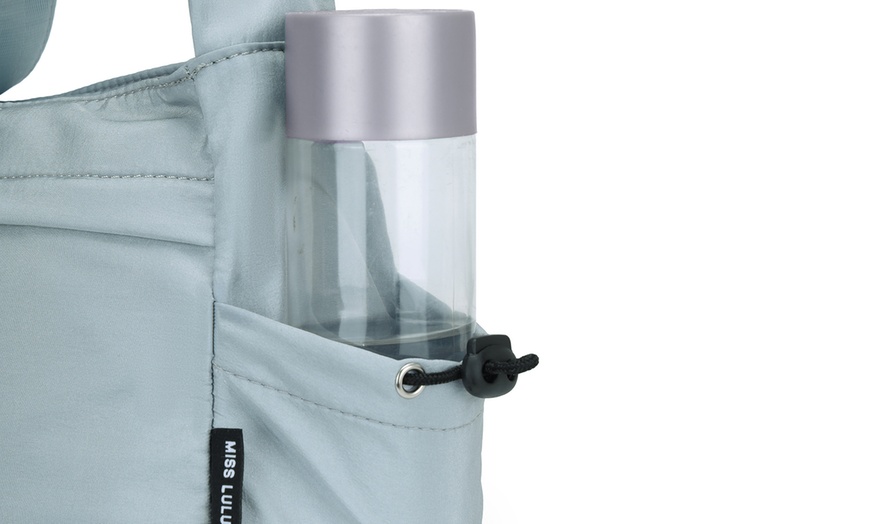 Image 12: Bandolera de estilo casual con correa ajustable y múltiples bolsillos
