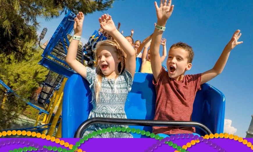 Image 3: Mardi Gras Celebration at Castle Park: Save Over (49% Off) - Includes Admission + Unlimited Rides + Mardi Gras Celebration!