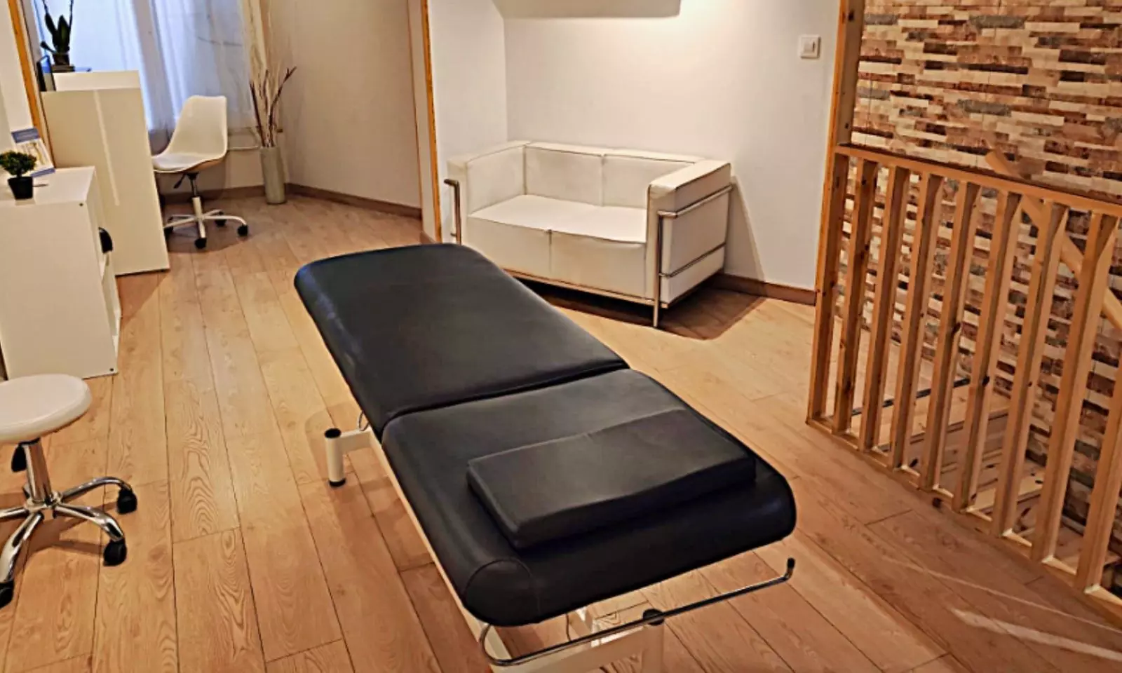 Primera visita quiropráctica con evaluación digital, ajuste e informe