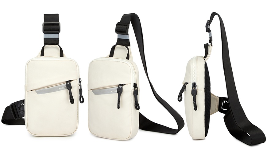 Image 4: Bolso bandolera unisex con correa ajustable y múltiples bolsillos
