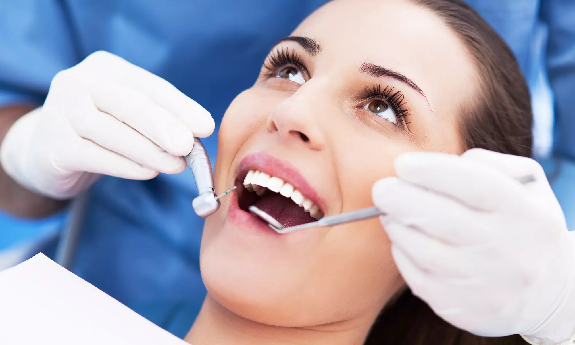 Dental Exam, Cleaning, and X-rays with Optional Teeth-Whitening Treatment at Smile Designs 101 (Up to 63% Off) - Primary Image