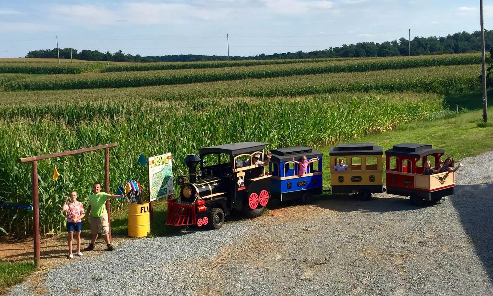 Corn Maze Package for Two or Four with Cow-Train Rides and Optional Apple Picking at Maize Quest (Up to 52% Off) - Primary Image