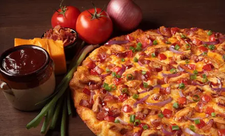 $12 for $25 Worth of Pizza and Italian-American Fare at Round Table Pizza - Primary Image