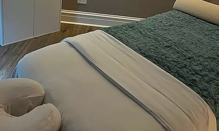 60- or 90-Min Deep Tissue Massage + Add-on or 90-Min Hot Stone Massage