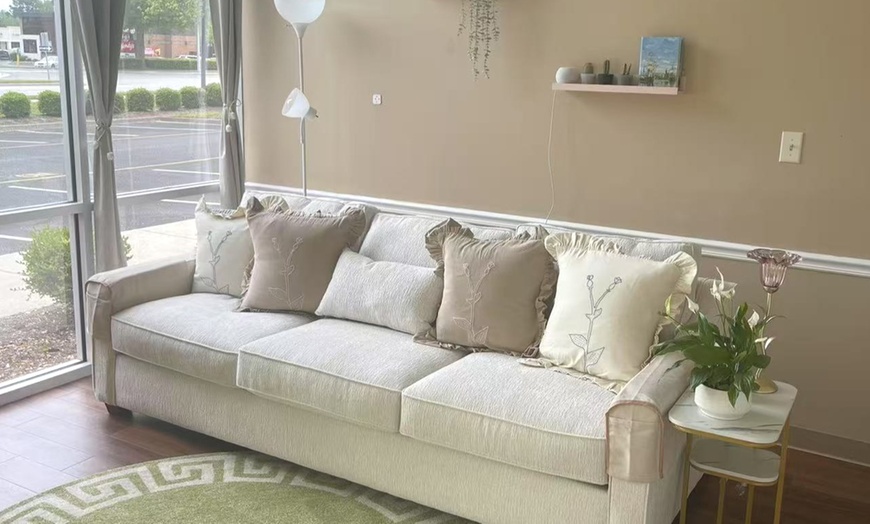 Image 11: Massages for 1 or 2 with Hot Towels, Organic Massage Oil and Lemon Tea