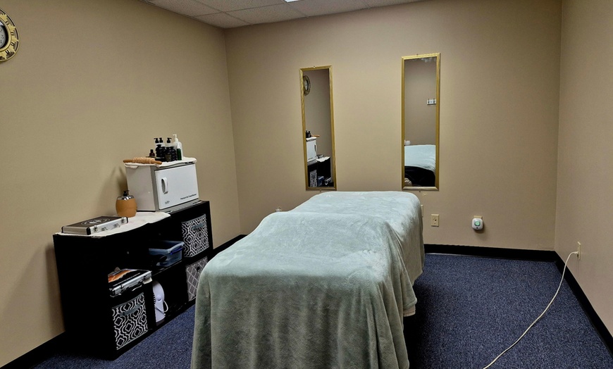 Image 3: Therapeutic, Hot Stone & Bamboo Massage Deal | Edgewood, KY
