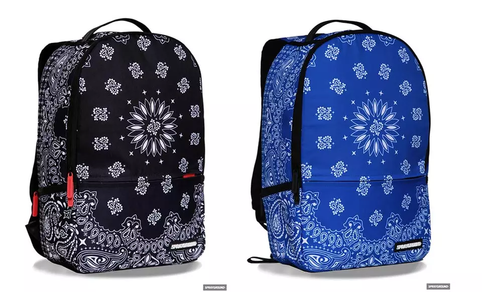 $49.99 for a Sprayground Deluxe Backpack ($60 List Price). Multiple Designs Available. Free Shipping and Returns. - Primary Image