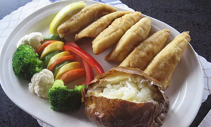 Steak and Seafood Dinner and Drinks for Two or Four at Sindbad's Restaurant and Marina (40% Off)  - Primary Image