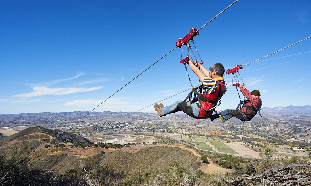 (Up to 16% Off) Double the Thrill: Hike & Zipline Packages for 2 or 4