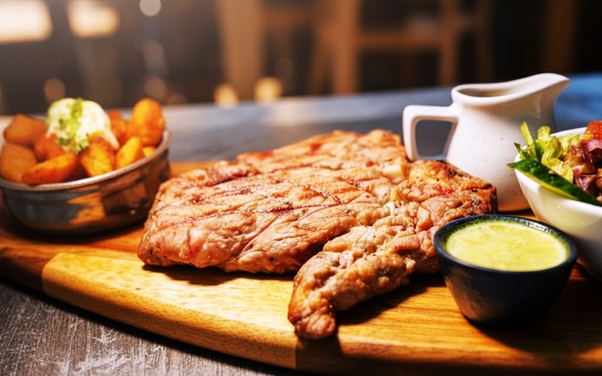 Sirloin steak with chunky chips and salad
