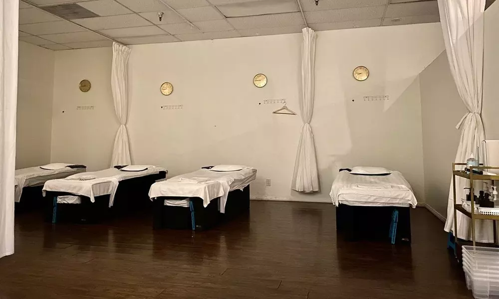 Deep Tissue, Foot and Body Combo, Hot Stone, or Couples Massage
