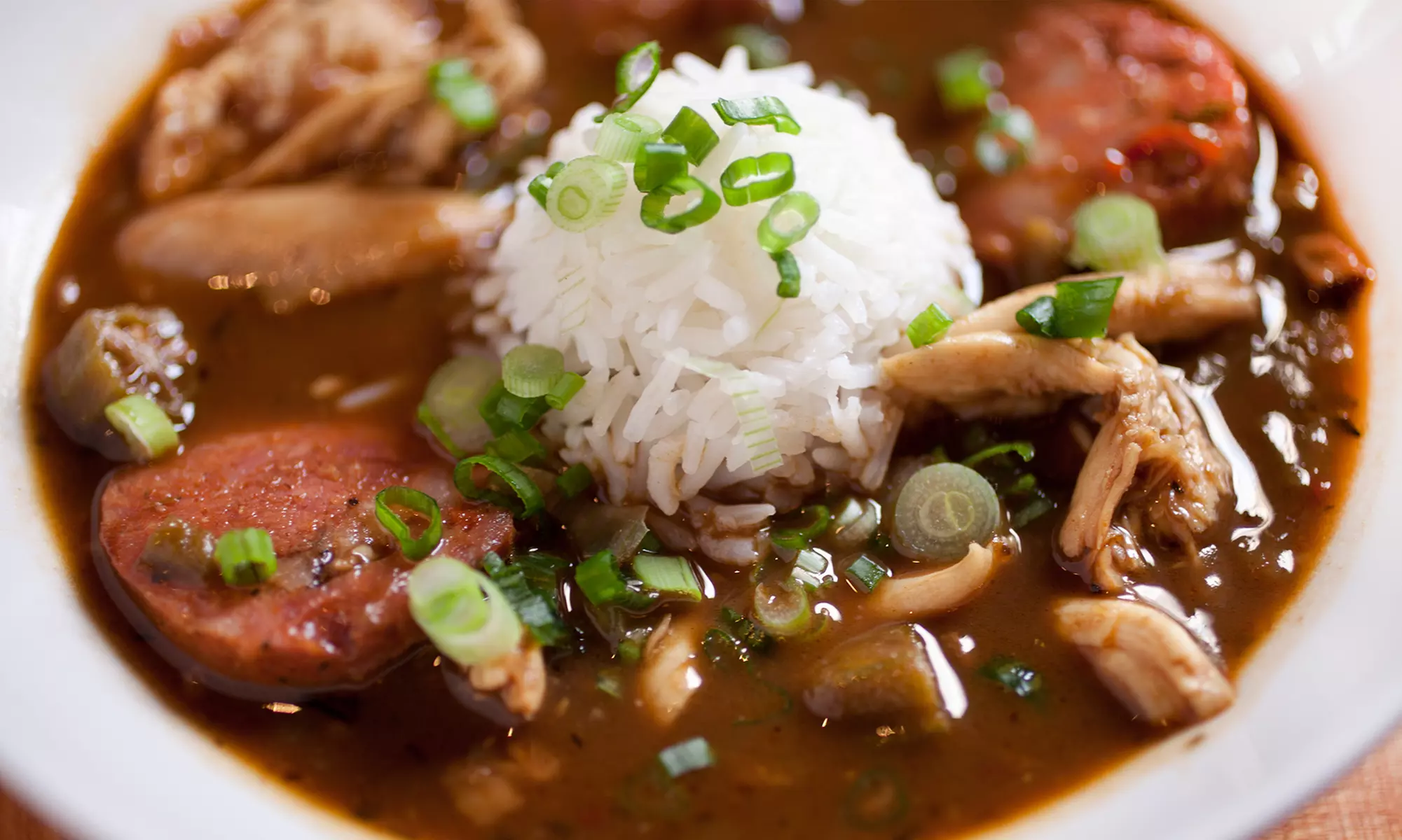 $12.50 for Two vouchers, Each Good for $10 at Charleston Caribbean Creole Food Truck Valid for takeout ($20) - Primary Image