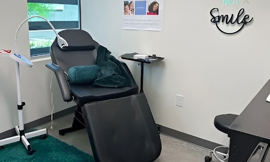 Image 1: Get a Brighter Smile w/ One / Two 30 or 60 min Teeth Whitening Options