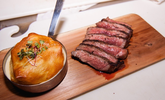 Upscale Fusion Cuisine and Drinks for Two or Four at 4935 Bar and Kitchen (Up to 44% Off)