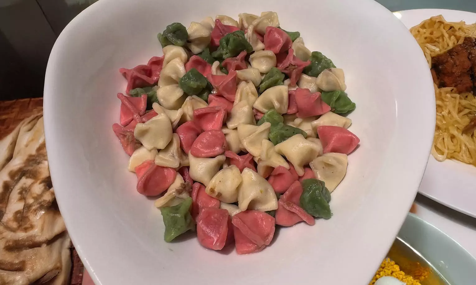 Manti (gefüllte türkische Teigtasche) nach Wahl mit Topping & Getränk