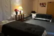 Indulge in Couples-60 Minutes Essential Oil plus Hot Stone (Up to 14% Off) at Green Massage And Foot Spa - Second Medium