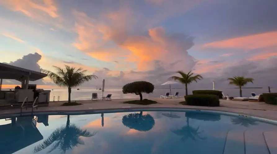 Relax by the water with stunning views and tropical vibes
