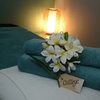 Image 4: Unwind with One 60 or 90 Minute Hot Stone or Coconut Oil Massage 