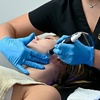 Image 3: Reveal Radiant Skin: Microdermabrasion or Dermaplaning Treatments