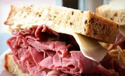 Sandwiches and Sides or Sandwich Catering Tray for 10 at The Corned Beef Factory (Up to 52% Off) - Primary Image