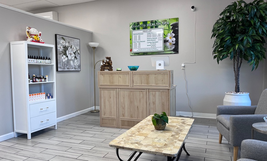 Image 9: Deluxe Full Body Massage with Choice of Hot Stone or Cupping Therapy