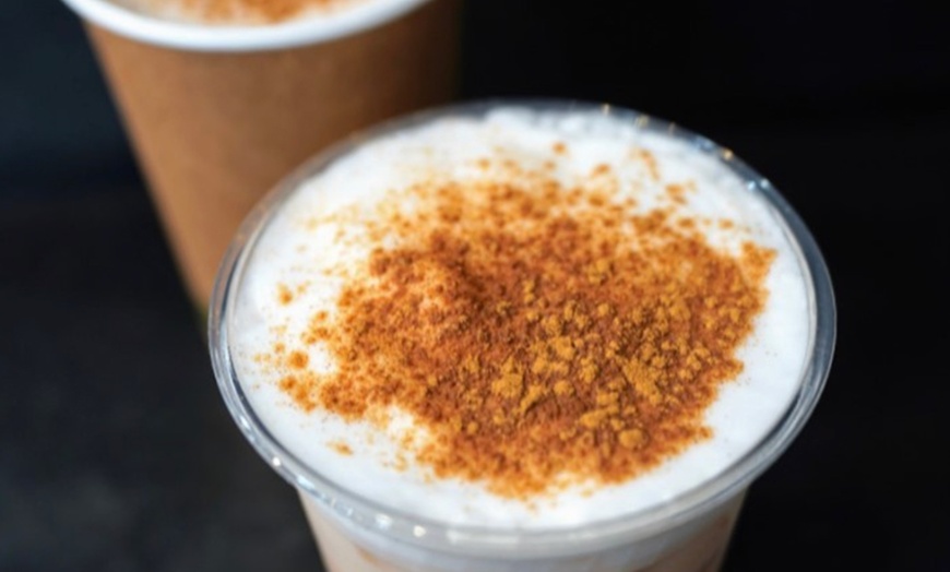 Image 13: Up to a Dozen Donuts, 4 Donuts & 2 Drinks or $50 to Spend