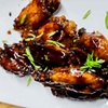 Image 2: $25, $50, $75 Towards Food or Hibiscus Jerk Wings & Choice of Drink!