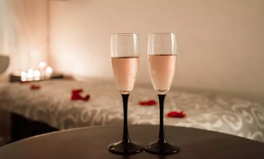 60-Min Choice of Massage w/ Choice of Facial & Complimentary Champagne