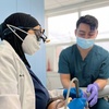 Image 1: Expert Care Ready: Dental Exam and X-Rays with Optional Cleaning