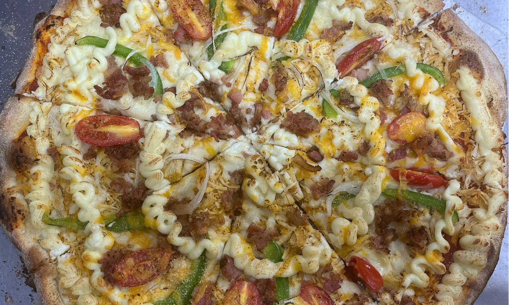 Enjoy a Pizza and Beer Combo or Two Pizzas for Sharing