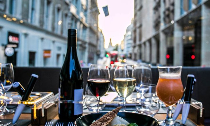 Image 7: NYC Panoramic Dining Experience: Six-Course Dinner Aboard Bustronome