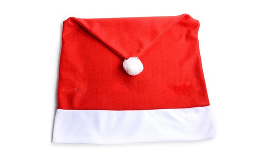 Image 5: Get Festive Four-Piece or Non-woven Christmas Chair Cover Set x4/x8