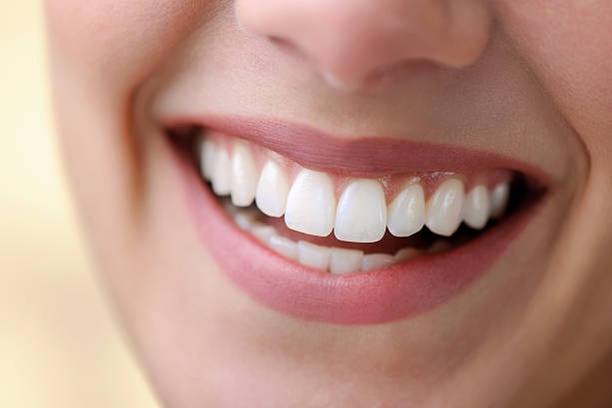 Brighten Your Smile with Teeth Whitening and Crystal Gem