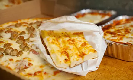 Pizza, Wings, and Pasta at Chris's 2 for 1 Pizza (Half Off). Three Options Available.  - Primary Image