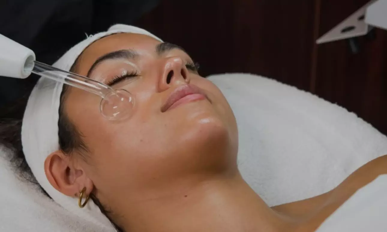 30-Minute Body Scrub w/ Optional Signature or Deluxe Hydrating Facial