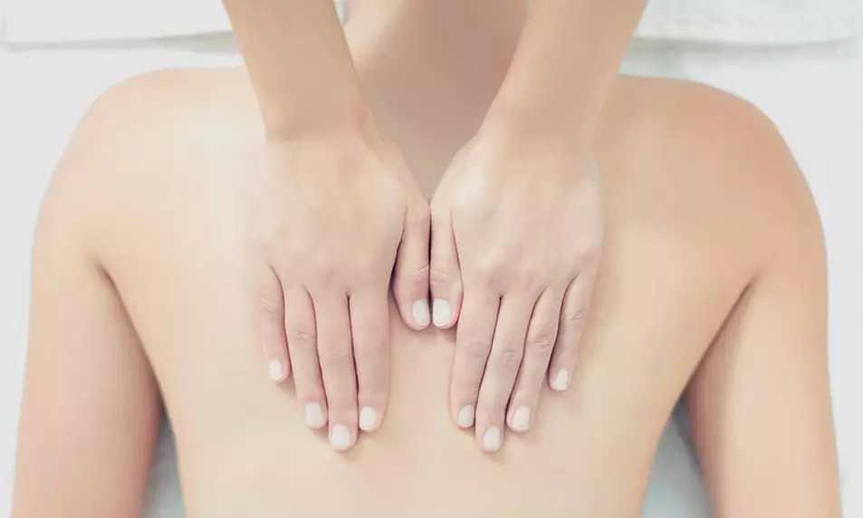Let's Heal Those Sore Muscles w/ 60 or 80-Min Therapeutic or Hot Stone Massage at A Therapeutic Touch (Up to 39% Off) - Primary Image