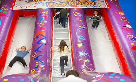 $20 for Open-Play Package with Arcade Tokens and Large Pizza at Jungle Bounce in Holiday (Up to $39.99 Value) - Primary Image