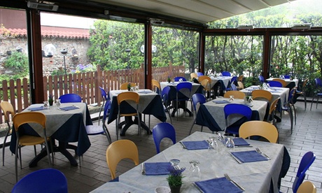 Menu paella con dolce e calice di vino per 2 o 4 persone al ristorante L'Elite 9 (sconto fino a 53%)