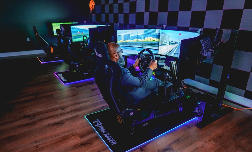 Image 1: Thrilling w/ One 30-Min Sim Racing Session for One, Two or Four People