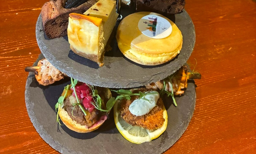 Image 1: Delight with Scouse Afternoon Tea with Optional Prosecco for Two or Four at Novotel Liverpool (Up to 64%
Off)