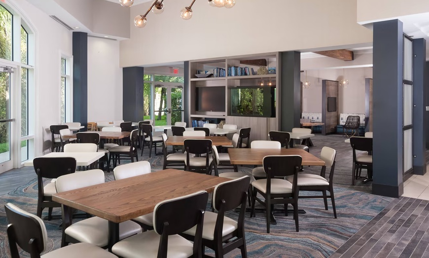 Image 12: Spacious suites, free breakfast, pool, and easy access to beaches