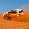 Image 1: Thrilling Desert Safari with BBQ, Self-Drive Quad Bike ride Options