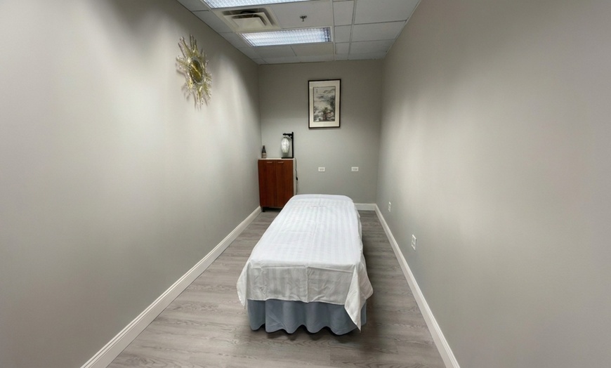 Image 3: Rejuvenating 45-Minute Deep Tissue Body Massage with Hot Stone Therapy