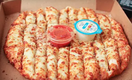 Pizza Package, Pizza and Wings Package, or $10 for $20 Worth of Pizza, Wings, and Drinks at Gumby's Pizza - Primary Image