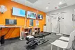 One or Two Knee Decompression Session w/ or w/o Class 4 Laser Therapy (Up to 88% Off) - Second Medium