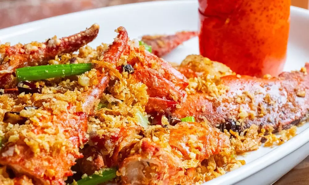 Savor $50 Dining Credit or Dinner with Cocktails for Two or Four