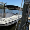 Image 1: Enjoy Relaxation and Fun with a Hurricane Deck Boat Rental! 